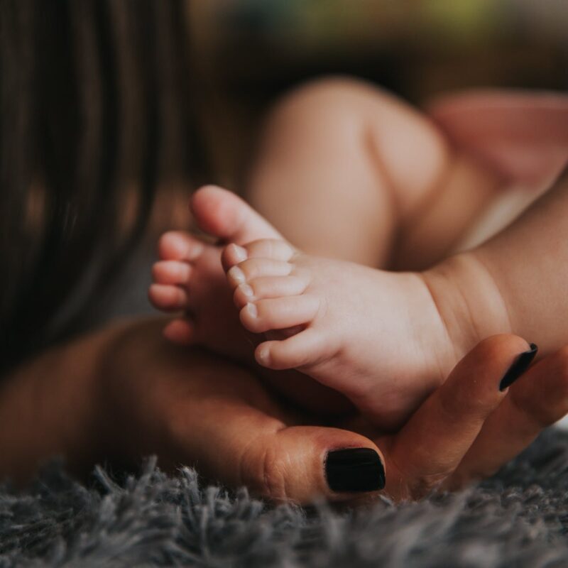 affection baby barefoot blur